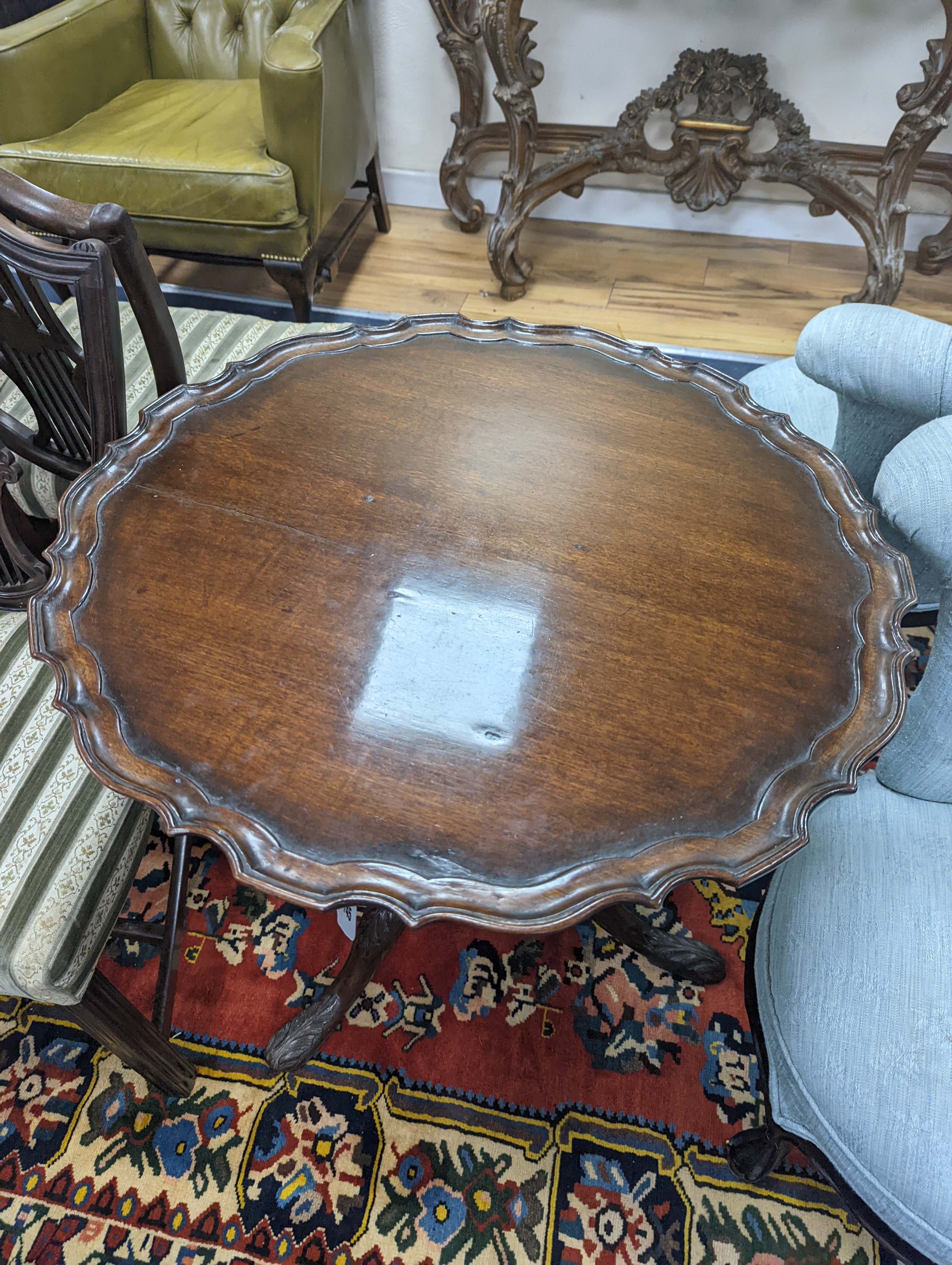 A George III and later circular mahogany tilt top birdcage tea table, diameter 69cm, height 72cm